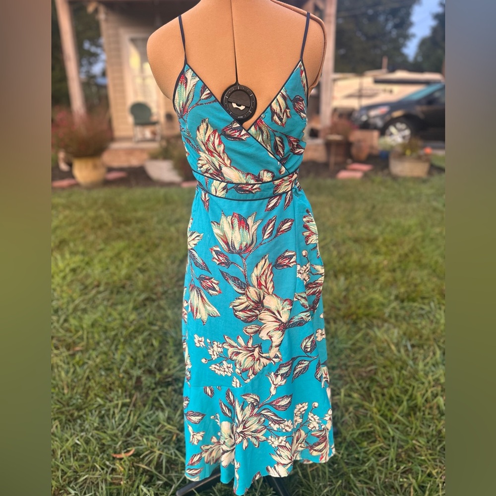 Band of the Free spaghetti strap dress size S. Mock wrap around. Flutter hem